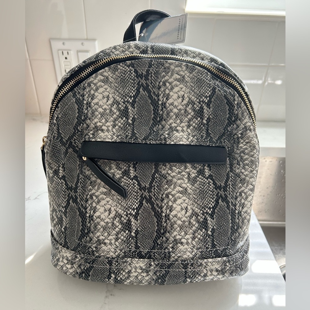 NWT snakeskin Under One Sky backpack.Purchased at Bloomingdales outlet. Gorgeous